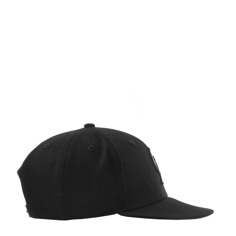 Black baseball cap with curved brim and stitched panels