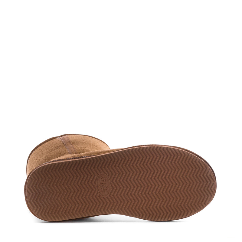 Chestnut suede boot outsole with textured tread and low flat heel.