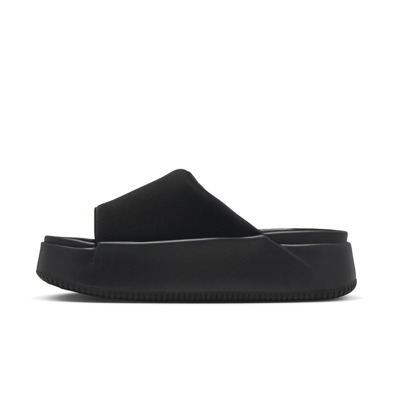 Women's black slide sandals on thick sole with curved upper and swoosh