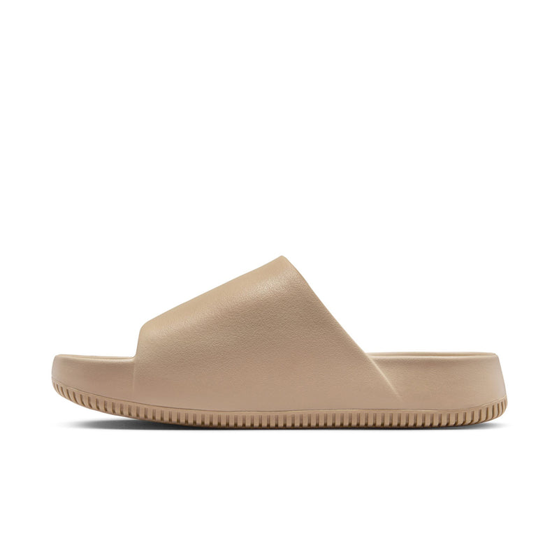 Khaki slip-on slide sandals with Nike swoosh detail and ribbed sole edge