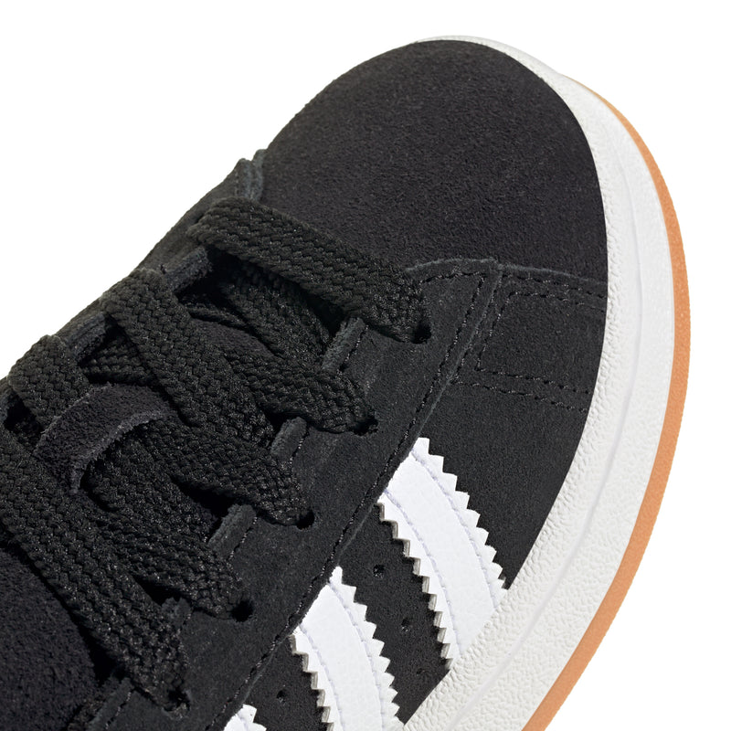 Kids black sneaker upper with black laces and white side stripes