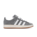 Men's grey low-top sneakers with white stripes, lace-up front, and gum sole