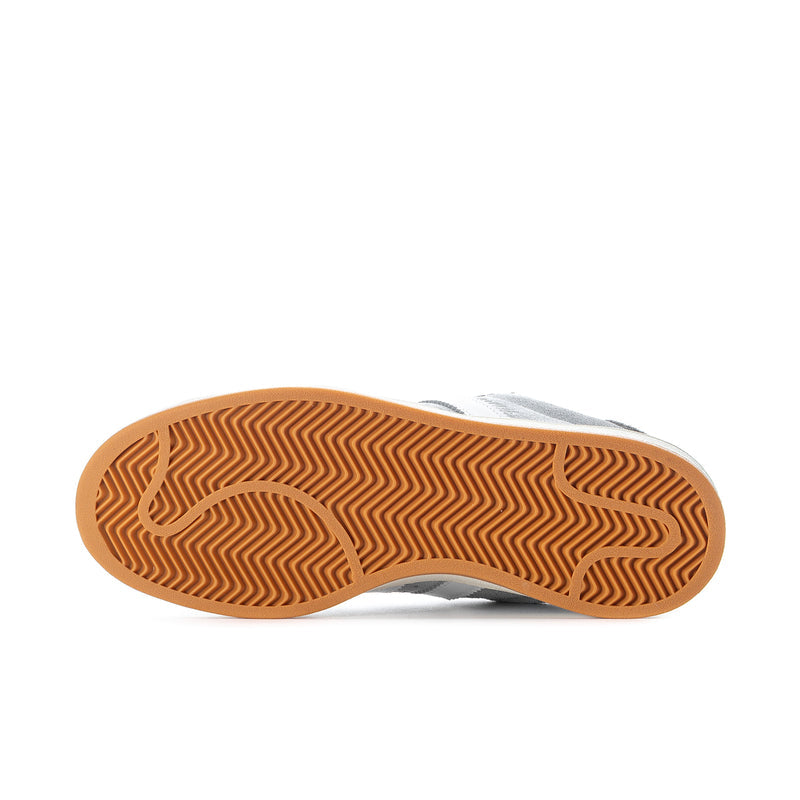 Men's grey low-top sneakers outsole with patterned gum rubber tread