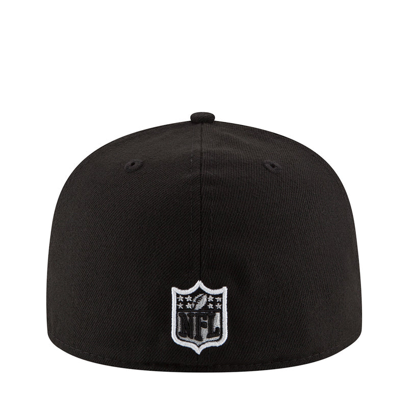 Black baseball cap with small white team shield logo on back