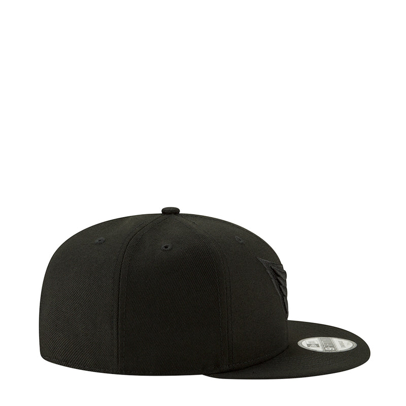 Black snapback cap, side profile with curved brim