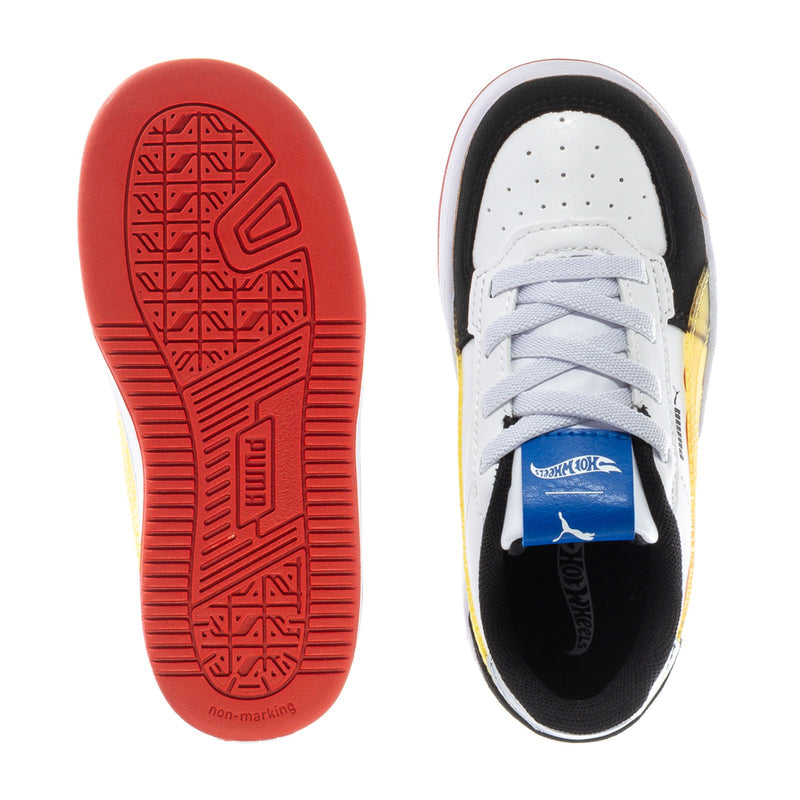 Toddler Puma sneakers outsole and toe view, red traction sole and white laces