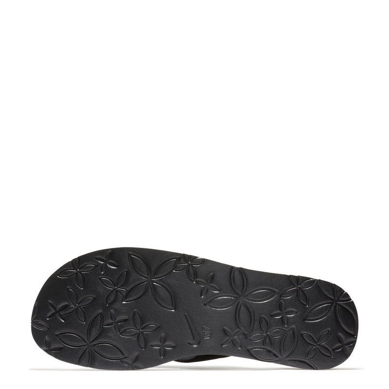 Women's black thong sandal outsole with embossed flower tread and grip