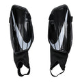 Charge ankle shin guards, black with white diagonal panels and elastic foot straps