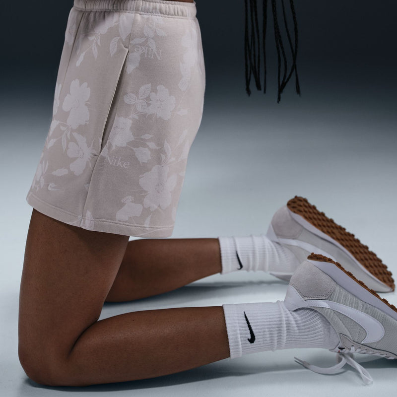 Women’s floral print shorts in light beige-tan with elastic waistband