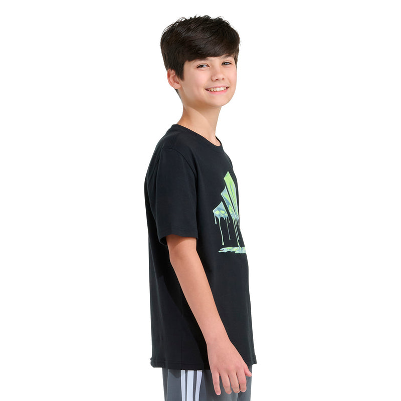 Youth black graphic T-shirt with neon green drip logo print, side view