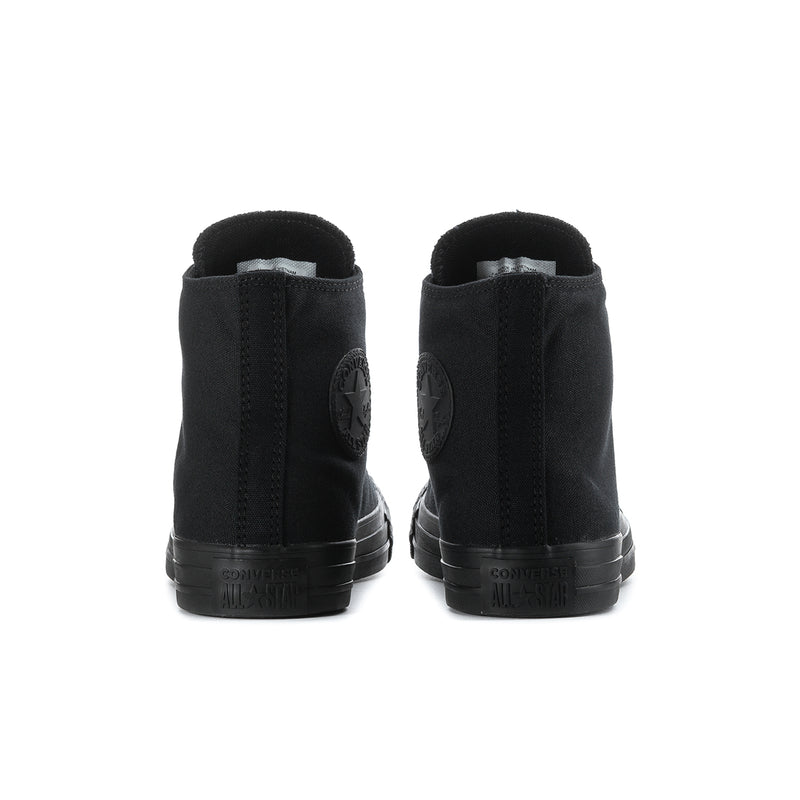 Black high-top sneaker heel view with back patch and rubber tread