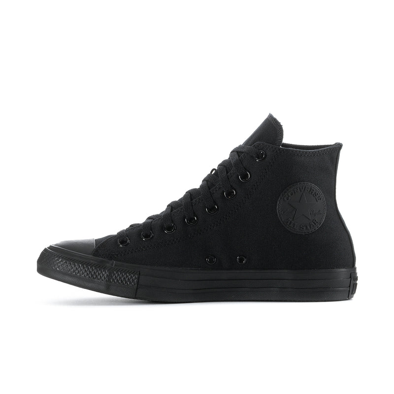 Black high-top sneaker side view with circular logo patch and laces