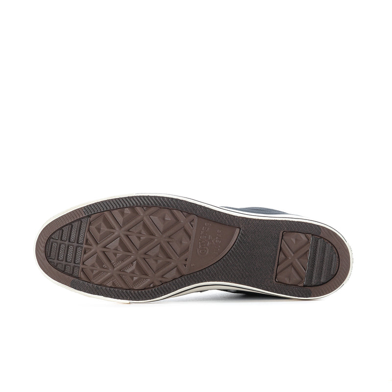 Black rubber sneaker outsole with textured tread and dark sidewall trim