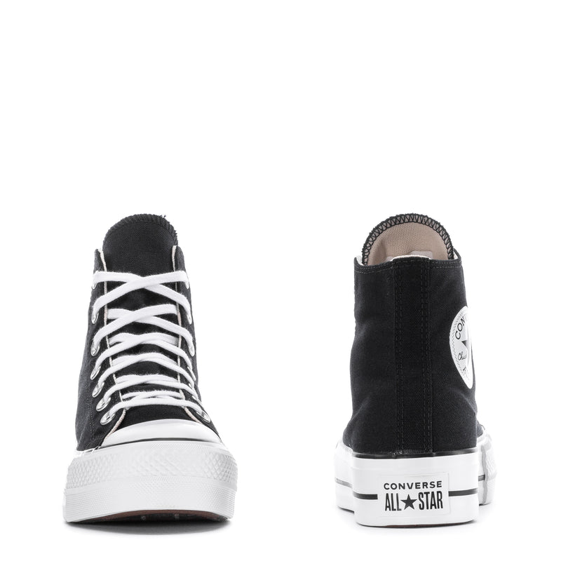Women's black high-top platform sneaker rear view with Converse All Star heel logo