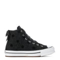 Youth black high-top platform sneakers with polka-dot texture, bows, and white laces
