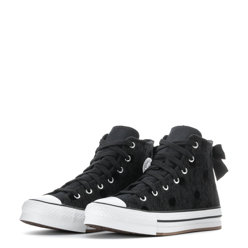Youth black high-top platform sneakers, laced pair with bows and white rubber toe caps
