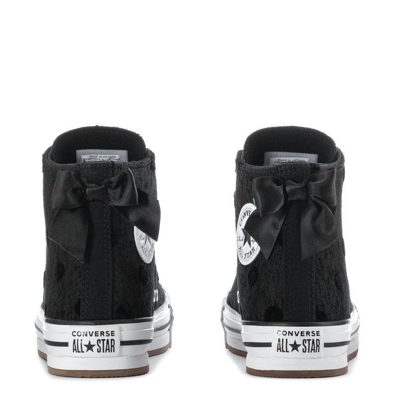Youth black high-top platform sneakers back view with bow details and Converse All Star heel