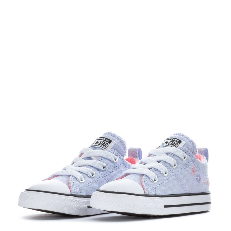 Pair of light blue toddler low-top canvas sneakers with embroidered accents and pink lining