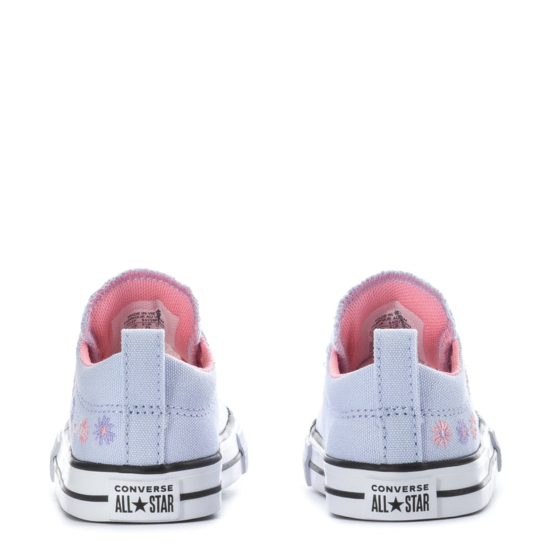 Light blue toddler low-top sneakers with pink heel lining and Converse All Star back label