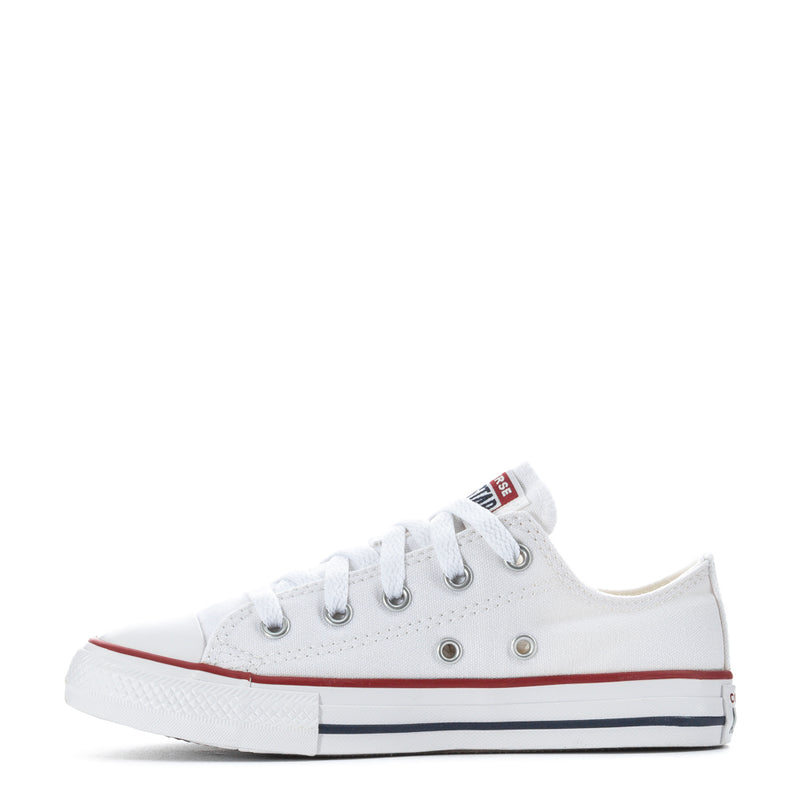 Kids white canvas low-top sneakers angled view with red trim, navy stripe, and laces