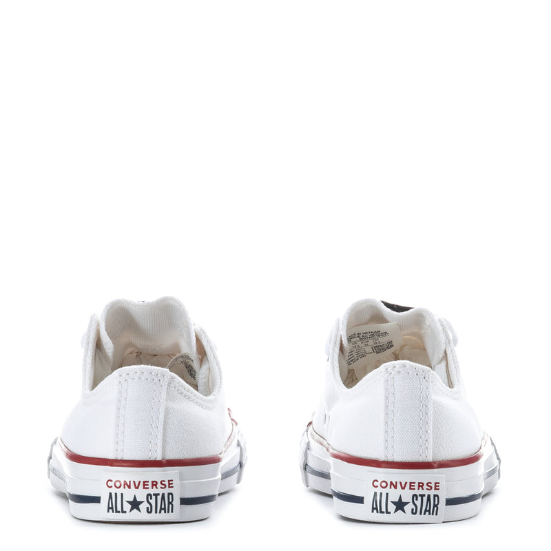 Kids white canvas low-top sneakers back view with Converse All Star heel patch detail
