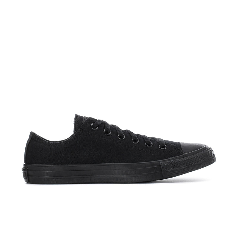 Black low-top lace-up canvas sneaker with rubber toe cap and dark vulcanized sole