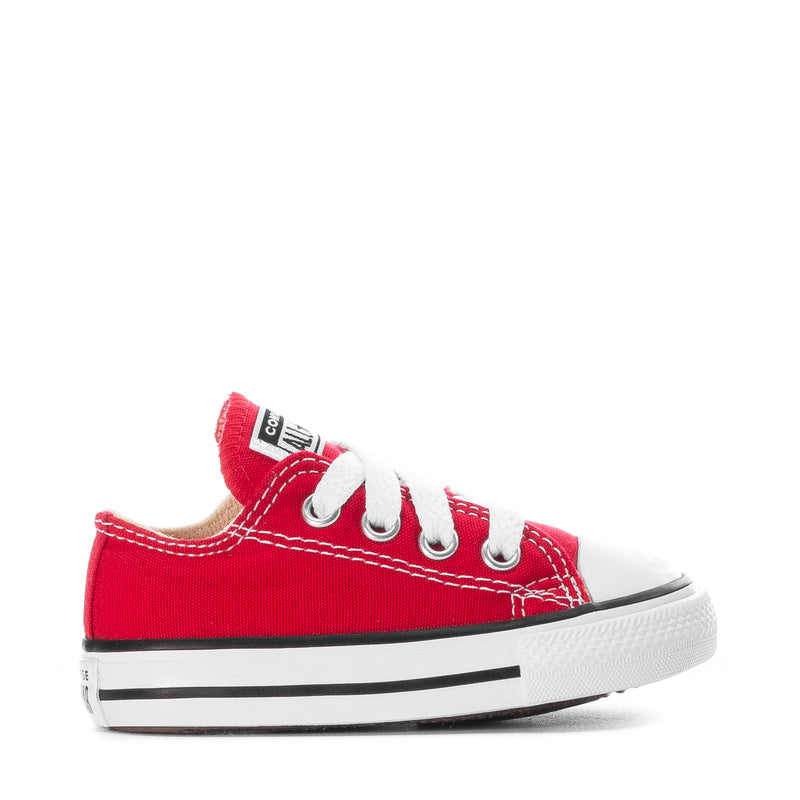Toddler red canvas low-top sneakers with white laces and white rubber toe cap