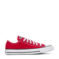 Youth red canvas low-top sneakers, white laces, rubber toe cap and black stripe sole