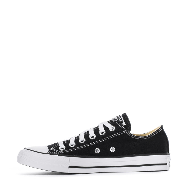 Youth black canvas low-top sneaker with white stitching, lace eyelets, and sole