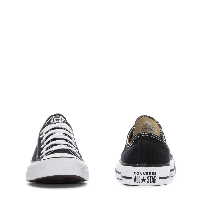 Youth black Converse All Star low-top sneakers, front and heel view
