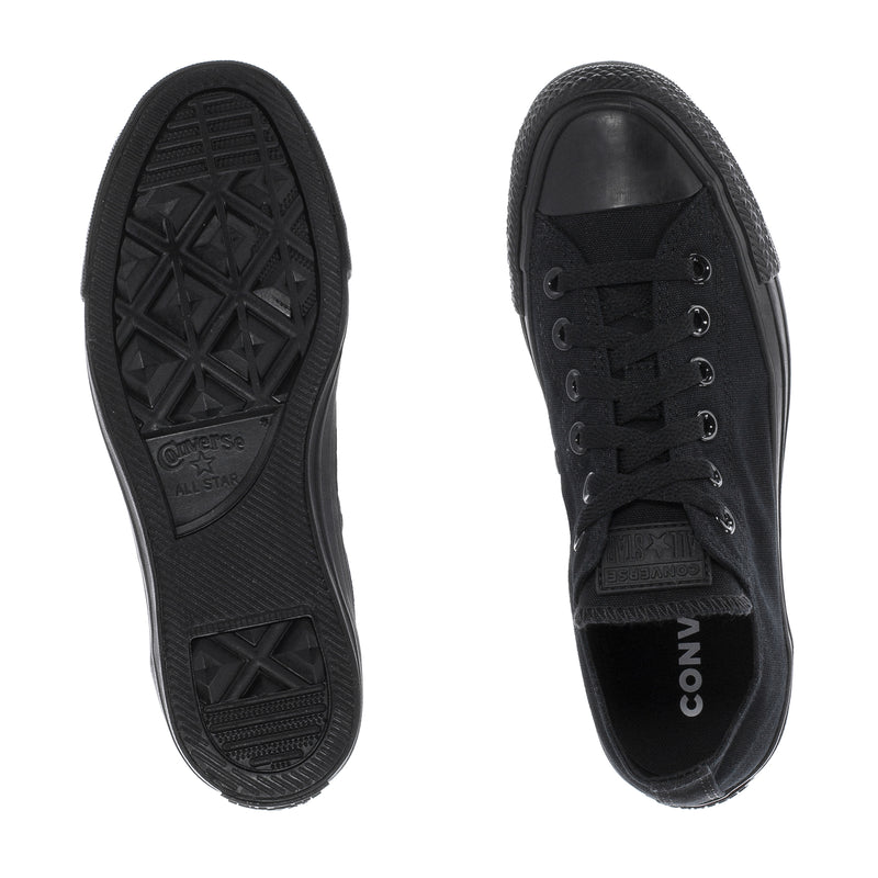 Youth Chuck Taylor All Star ox sneakers in black, outsole and side view