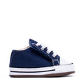 Infant navy canvas low-top sneakers with white toe cap, laces, and rubber sole