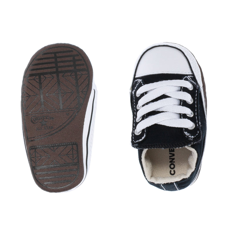 Black infant sneakers: textured sole underside and fur-lined collar inside