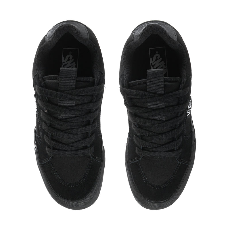 Black chukka-style sneakers with lace closure and padded collar, Vans logo