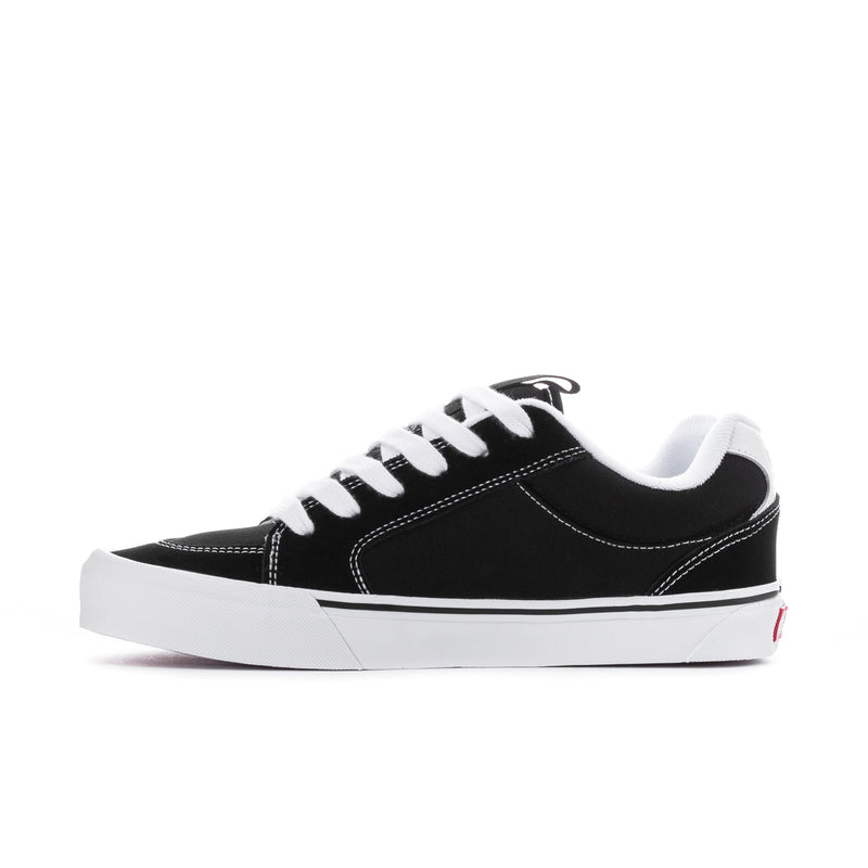 Men's Vans chukka push sneaker side profile, black upper with white laces and sole