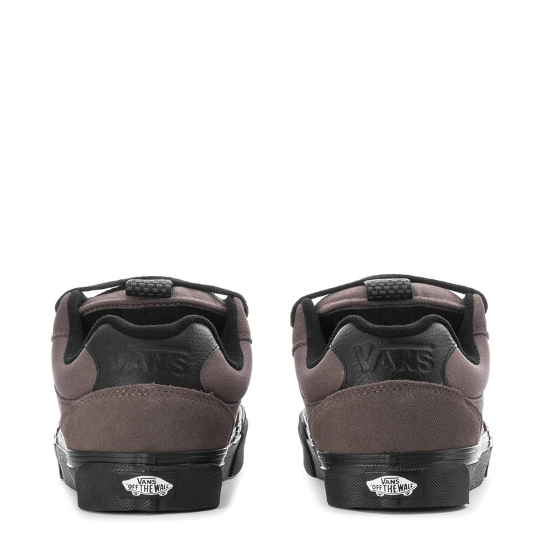 Vans chukka-style sneakers, mauve heels with black trim and outsole