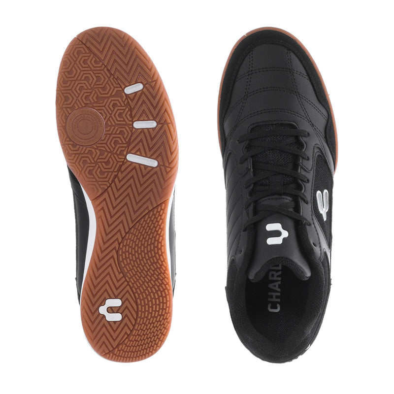 Men's black sneaker outsole and interior view with gum-brown tread sole