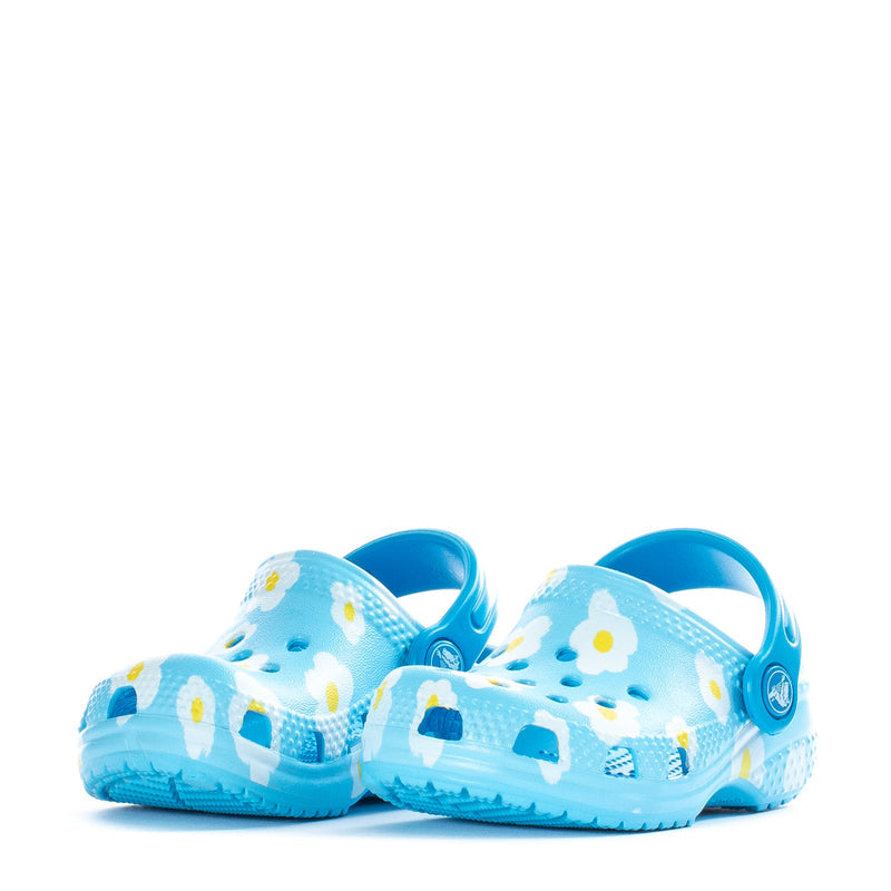 Infant clog pair, light blue with daisy-and-house print and blue heel straps