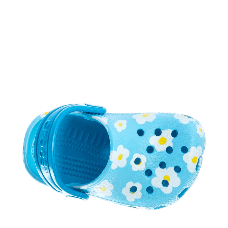 Infant clog open heel view, light blue daisy-and-house print with blue interior