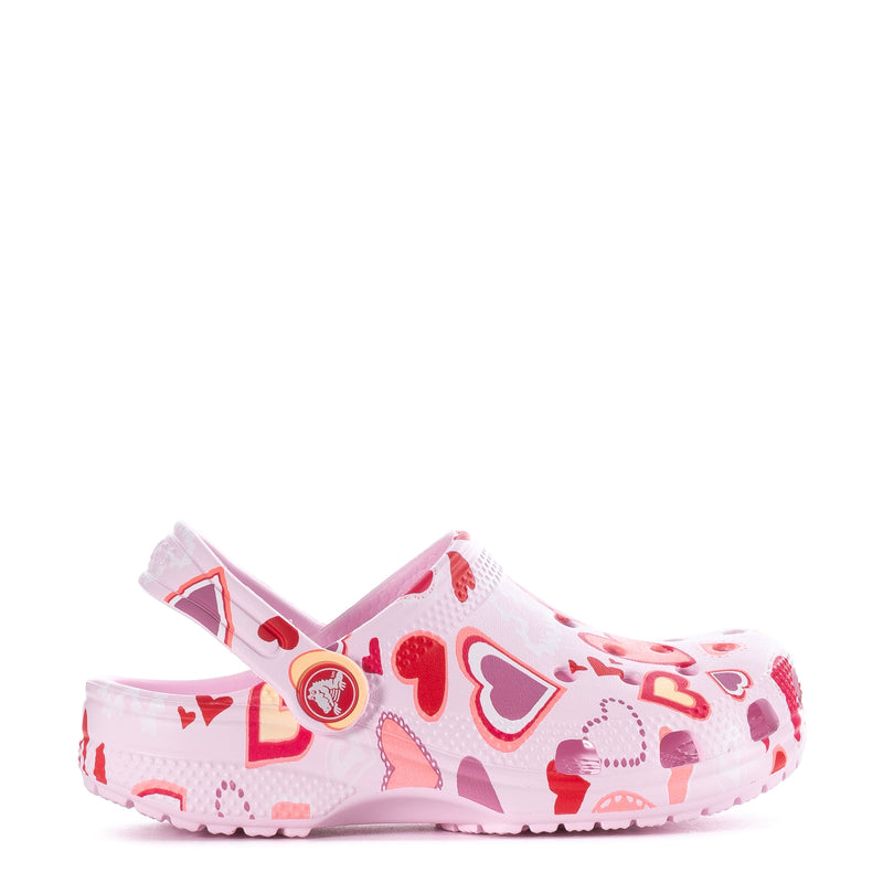Kids' pink clog with heart pattern and round side charm detail