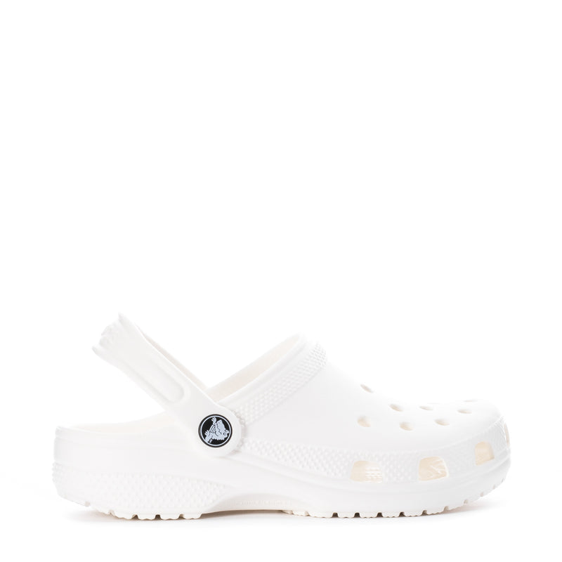 Kids' white clog with side vent holes, perforated upper, and logo patch