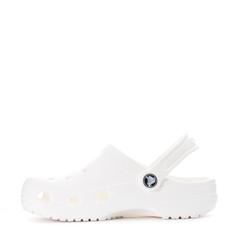 Kids' white clog in side view with adjustable strap and textured upper