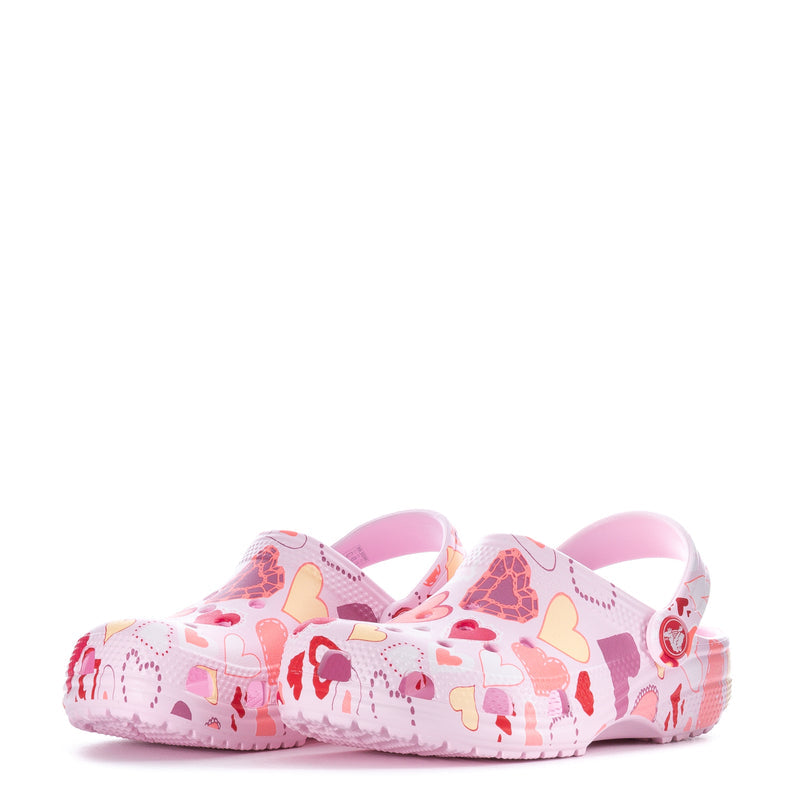 Kids' pink clog with heart-patterned upper and rear strap detail