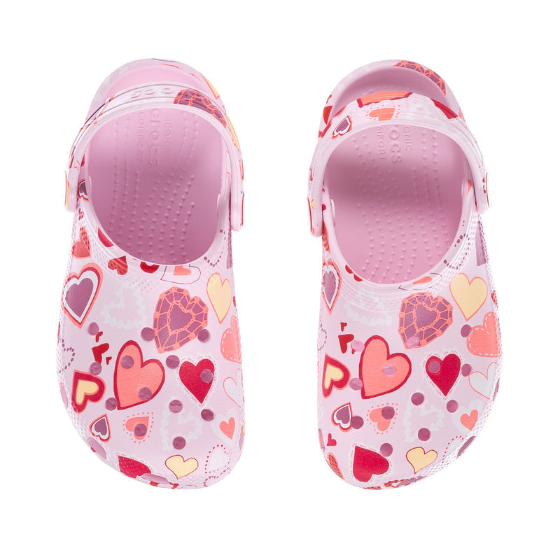 Kids' pink clogs with heart-print upper and textured footbed openings