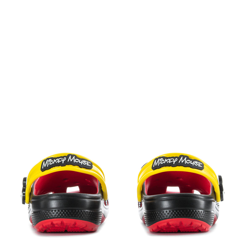 Kids clogs rear view, black heel with red foam sole and yellow Mickey Mouse logo