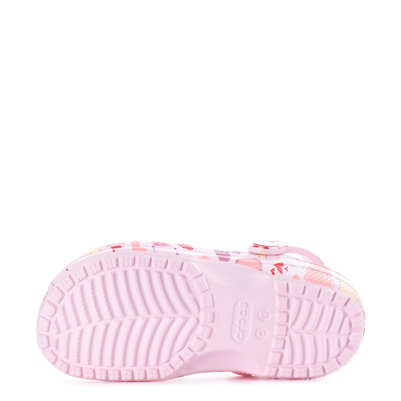 Kids' pink clog outsole tread view
