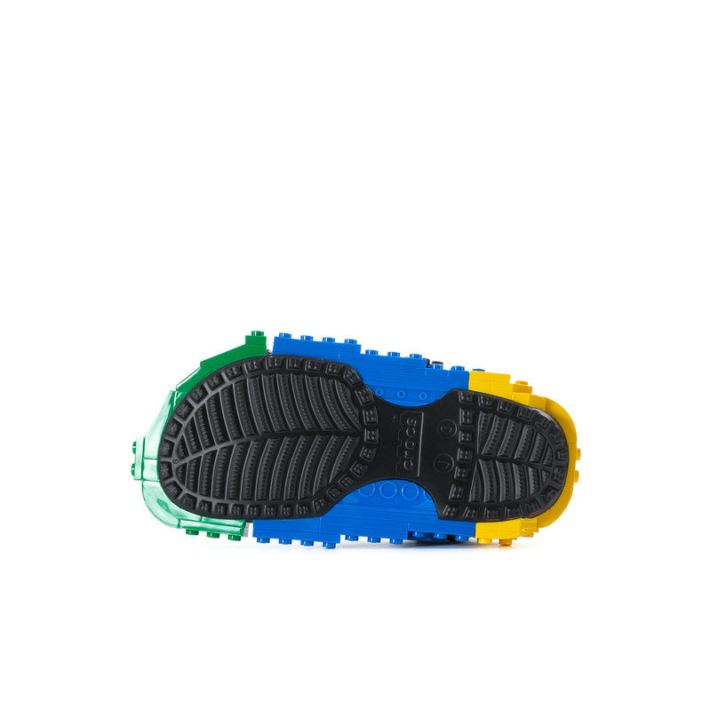 Kids clog outsole bottom with textured tread and colorful LEGO-block edges.