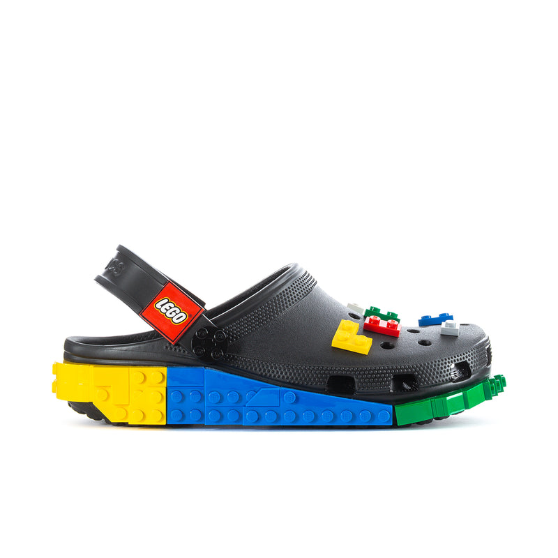 Men's black clog with LEGO-brick platform sole in yellow, blue, and green