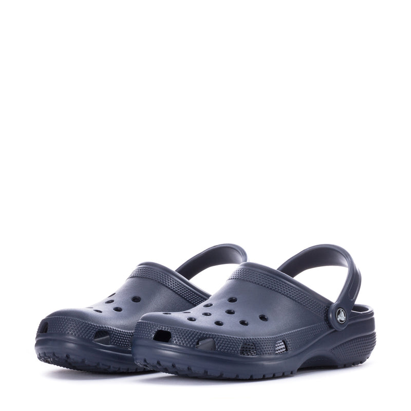 Pair of navy men’s clogs with perforated toe and curved back straps