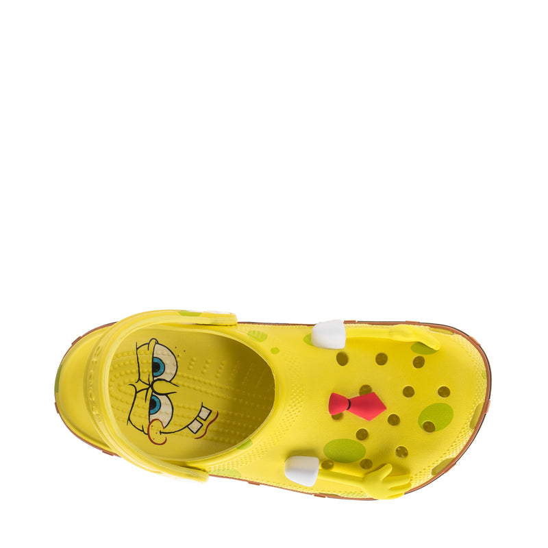 Men's yellow clog with footbed cartoon print and white studs on the top